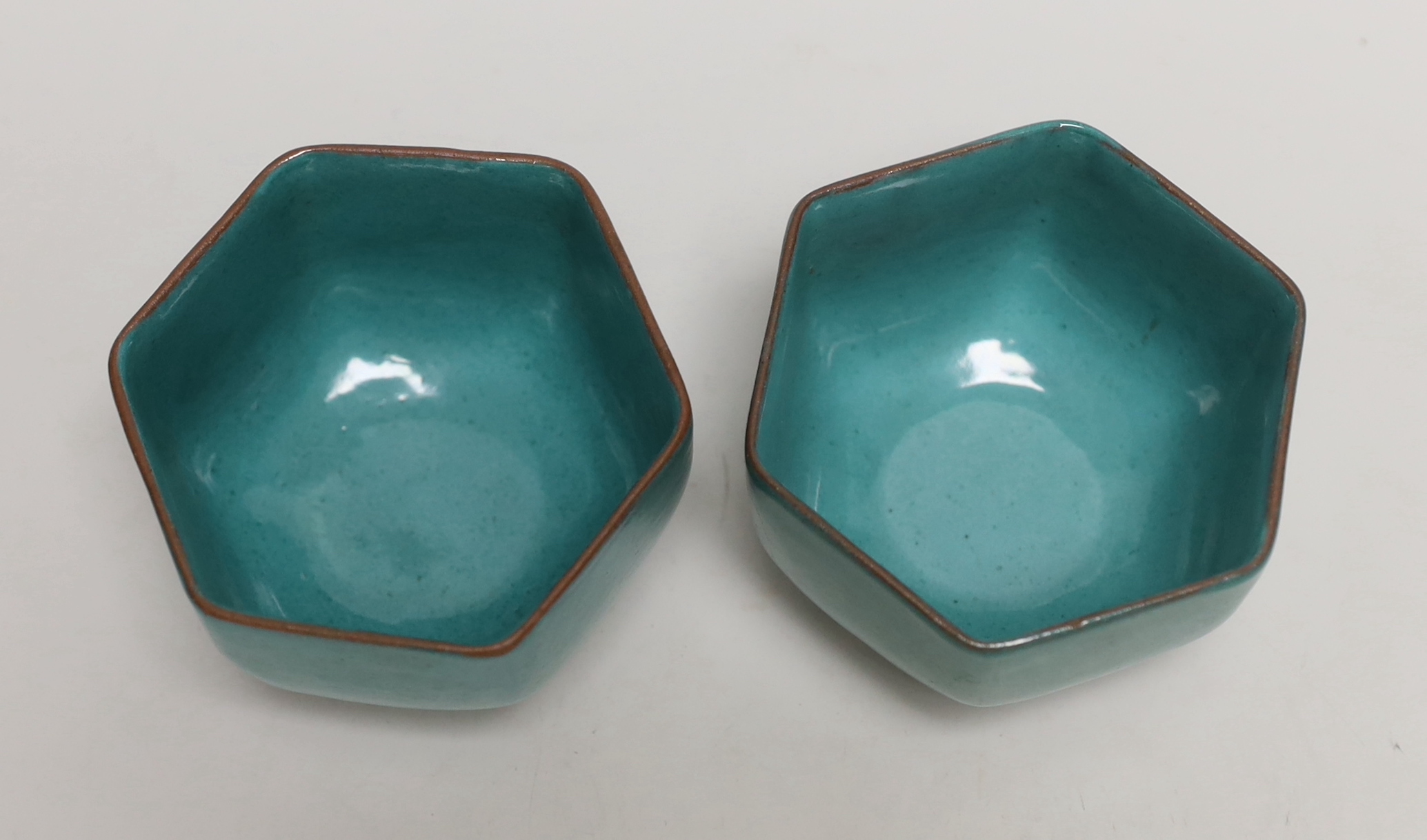 A pair of Chinese Yixing green glazed hexagonal bowls, 6.5cm